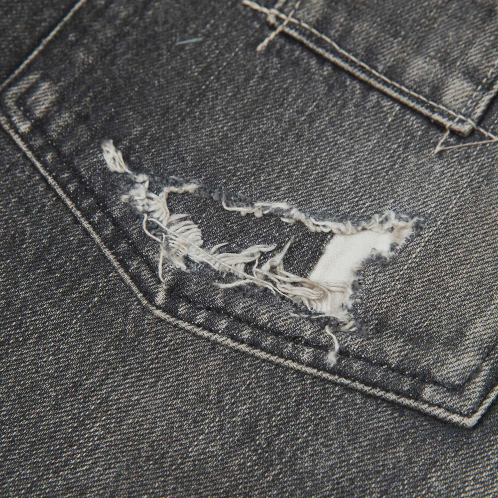 MADNESS HARD AGING DENIM PANTS. RELAXED (DAMAGED AND